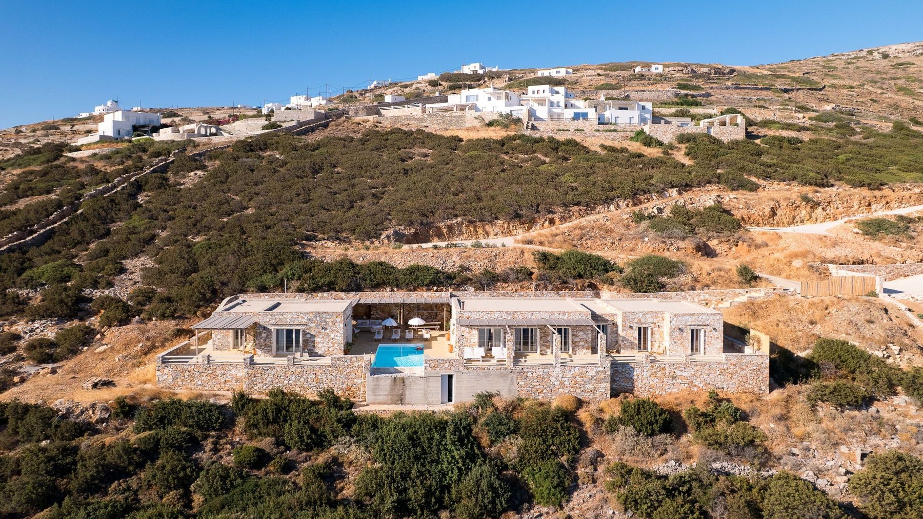 The villa built into the hillside above the Aegean