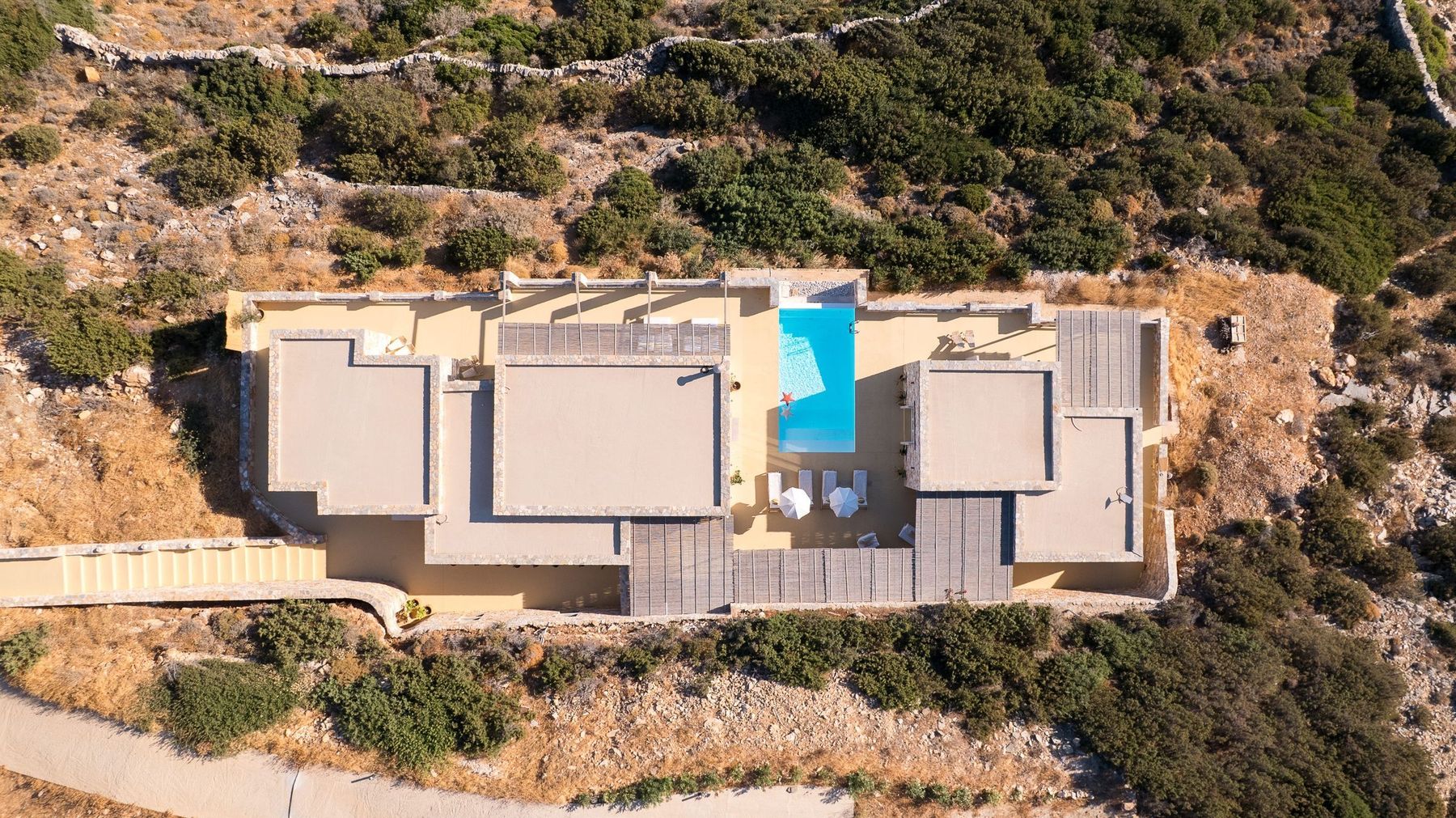 Flat roofs and terraces cut into the rock