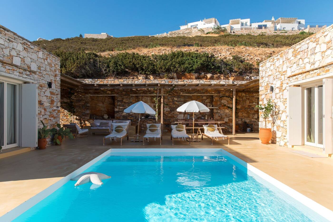 Pool deck with sun loungers